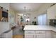 Bright kitchen featuring an island, with sight lines into the breakfast area at 16546 E Ashbrook Dr # A, Fountain Hills, AZ 85268