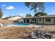 Backyard featuring a swimming pool, patio, and landscaping at 2136 W Sharon Ave, Phoenix, AZ 85029