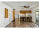 Spacious kitchen with bar seating, connecting to a bright and airy living space at 2136 W Sharon Ave, Phoenix, AZ 85029