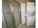 Bathroom featuring a shower and a stacked washer/dryer at 2315 S Seminole Dr, Apache Junction, AZ 85119