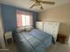 Bedroom features a ceiling fan and a pair of white dressers at 2315 S Seminole Dr, Apache Junction, AZ 85119