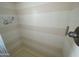 Shower features horizontal striped tile and adjustable shower head at 2315 S Seminole Dr, Apache Junction, AZ 85119