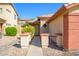 Inviting front entrance with a walkway leading to the front door and well-maintained desert landscaping at 23836 W Jefferson St, Buckeye, AZ 85396