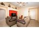 Cozy living room featuring two comfortable sofas, ceiling fan, and an inviting atmosphere at 23836 W Jefferson St, Buckeye, AZ 85396