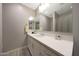 Bathroom featuring a modern sink, large mirror, and a shower with a shower curtain at 240 W Missouri Ave # 13, Phoenix, AZ 85013