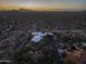 Aerial view of the property nestled amidst desert landscape at 25002 N Quail Haven Dr, Rio Verde, AZ 85263