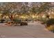 Circular driveway with desert landscaping including a variety of cacti and trees at 25002 N Quail Haven Dr, Rio Verde, AZ 85263