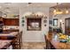 Kitchen featuring wood cabinets, tile floors, and a decorative pass-through window at 25002 N Quail Haven Dr, Rio Verde, AZ 85263