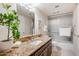 Bathroom featuring granite counters, large vanity, and shower over tub at 2514 E Montebello Ave, Phoenix, AZ 85016