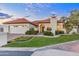 Charming single-story home featuring a red tile roof, manicured landscaping, and an attached two-car garage at 2514 E Montebello Ave, Phoenix, AZ 85016