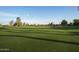 Beautiful green golf course with a wide-open fairway under a partly cloudy sky, perfect for golfing at 2514 E Montebello Ave, Phoenix, AZ 85016