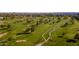 Panoramic aerial shot of a golf course featuring lush green fairways, sand traps, and mature trees at 2514 E Montebello Ave, Phoenix, AZ 85016