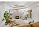 Bright living room featuring tile floors, recessed lighting, and a fireplace at 2514 E Montebello Ave, Phoenix, AZ 85016