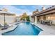 Sparkling pool with inviting lounge area and covered dining space at 2514 E Montebello Ave, Phoenix, AZ 85016