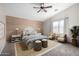 Relaxing bedroom showcasing a decorative wood wall and coordinated furniture at 2525 E Misty Willow Ln, Phoenix, AZ 85024