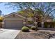 Beautiful single-story home with a two-car garage and drought resistant landscaping at 2525 E Misty Willow Ln, Phoenix, AZ 85024