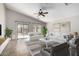 Comfortable living room with sliding glass door and neutral furniture at 2525 E Misty Willow Ln, Phoenix, AZ 85024