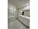 Bathroom featuring a walk-in shower, a tiled floor, and a double vanity at 25678 N Boreas Rd, Florence, AZ 85132