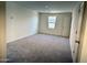 Bedroom featuring plush carpeting and a built-in closet, providing ample storage at 25678 N Boreas Rd, Florence, AZ 85132