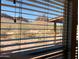 Scenic mountain views visible through the window blinds at 27575 N Dolores Pl, San Tan Valley, AZ 85144