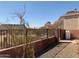 Backyard featuring desert landscaping, rod iron fence and view of mountains at 27575 N Dolores Pl, San Tan Valley, AZ 85144