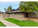 Exterior view showcasing well-maintained landscaping around the side of the home at 286 W Palomino Dr # 101, Chandler, AZ 85225