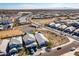 Aerial view of a desert community featuring single Gathering homes and desert landscaping at 3029 S 78Th Dr, Phoenix, AZ 85043