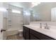 Bright bathroom with a white vanity and a shower/tub combination at 3029 S 78Th Dr, Phoenix, AZ 85043