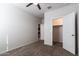 Bedroom features neutral walls, plush carpeting, and a ceiling fan at 3029 S 78Th Dr, Phoenix, AZ 85043