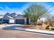 Attractive single-Gathering home featuring a gray color scheme, manicured landscaping, and an attached garage at 3029 S 78Th Dr, Phoenix, AZ 85043