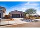 Beautiful one-story home with desert landscaping, gray exterior paint and two-car garage at 3029 S 78Th Dr, Phoenix, AZ 85043