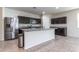 Bright kitchen with stainless steel appliances and granite countertops at 3029 S 78Th Dr, Phoenix, AZ 85043