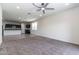 Open floor plan featuring spacious living room with seamless access to the kitchen at 3029 S 78Th Dr, Phoenix, AZ 85043