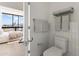 En suite bathroom featuring a view from the bedroom with modern fixtures and neutral color palette at 312 E Windsor Ave # 2, Phoenix, AZ 85004