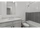 Stylish bathroom with modern fixtures, tiled shower, and elegant vanity with ample counter space at 32489 N 135Th Dr, Peoria, AZ 85383