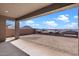 Covered patio area with expansive backyard view, perfect for outdoor relaxation and entertainment at 32489 N 135Th Dr, Peoria, AZ 85383