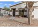 Charming home featuring desert landscaping and decorative details on the facade at 330 E Cheyenne Rd, San Tan Valley, AZ 85143