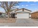 Charming single-story home with neutral stucco, manicured landscaping, and a two-car garage at 330 E Cheyenne Rd, San Tan Valley, AZ 85143