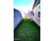 Backyard featuring an artificial turf yard with a block wall at 3648 E Perkinsvile St, Gilbert, AZ 85295