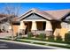 Inviting home showcasing stone accents, a cozy porch, and neat landscaping for great curb appeal at 3648 E Perkinsvile St, Gilbert, AZ 85295