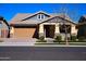 Attractive single-Gathering home with a well-manicured lawn, neutral palette, and a welcoming entrance at 3648 E Perkinsvile St, Gilbert, AZ 85295