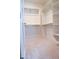 Spacious walk-in closet with shelving and hanging rods, ideal for organized storage at 3648 E Perkinsvile St, Gilbert, AZ 85295