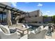 Modern backyard featuring a pool, covered patio, and stylish outdoor seating perfect for entertaining guests at 37200 N Cave Creek Rd # 1072, Scottsdale, AZ 85262