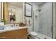 Modern bathroom featuring geometric glass shower stall, bright vanity and fixtures at 37200 N Cave Creek Rd # 1072, Scottsdale, AZ 85262