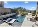 Relaxing backyard pool featuring integrated tanning ledge and golf course views at 37200 N Cave Creek Rd # 1072, Scottsdale, AZ 85262