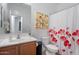 Bathroom featuring a tub, shower, painted bird artwork and painted flower shower curtain at 378 W Satinka Dr, San Tan Valley, AZ 85140