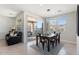 Inviting dining area with a sliding glass door to the patio and a view of the backyard at 378 W Satinka Dr, San Tan Valley, AZ 85140