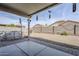 A backyard features a cement patio, rock landscaping, and a above ground pool at 39935 N Passaro Dr, San Tan Valley, AZ 85140