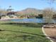 Beautiful community pond with ducks, bridge and gazebo with mountain views at 40656 N Key Ln, Anthem, AZ 85086