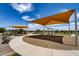 Community playground featuring swings and a shaded area to enjoy some outdoor fun at 4185 E Kolin Ln, San Tan Valley, AZ 85143